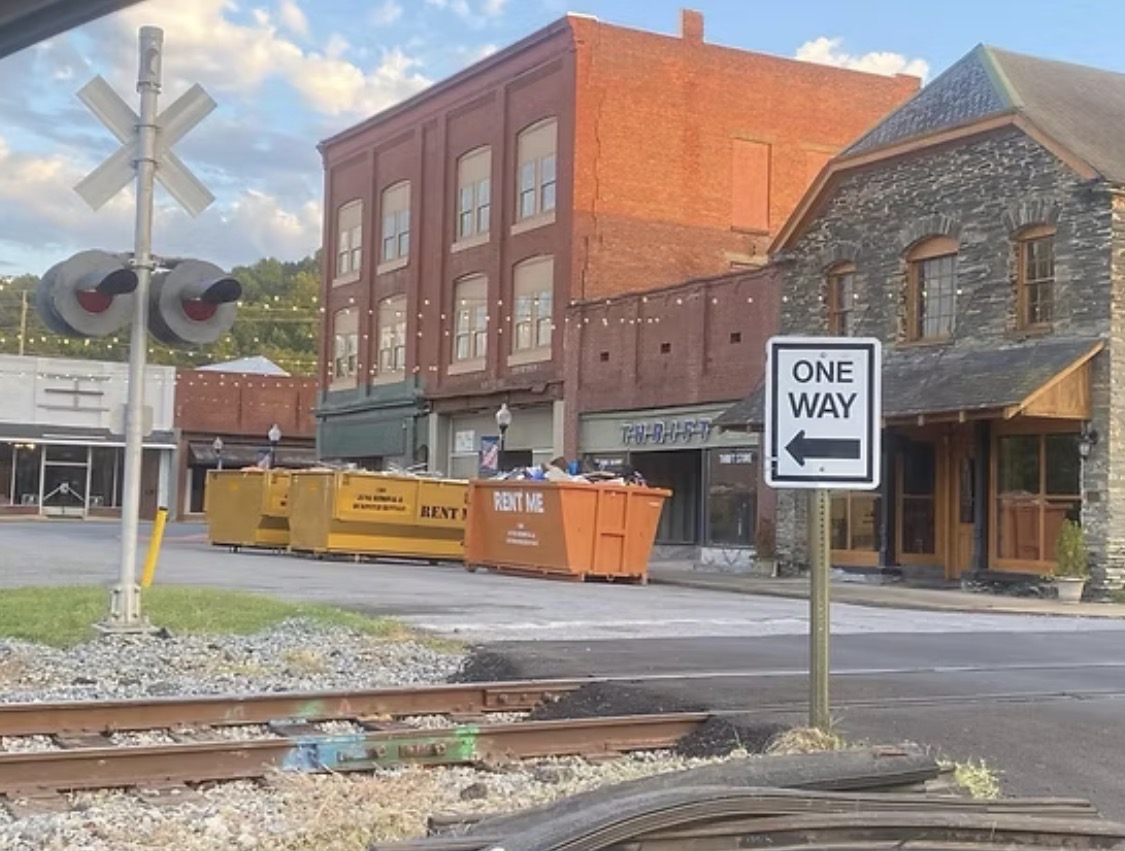 180 roll-off dumpsters placed near downtown buildings