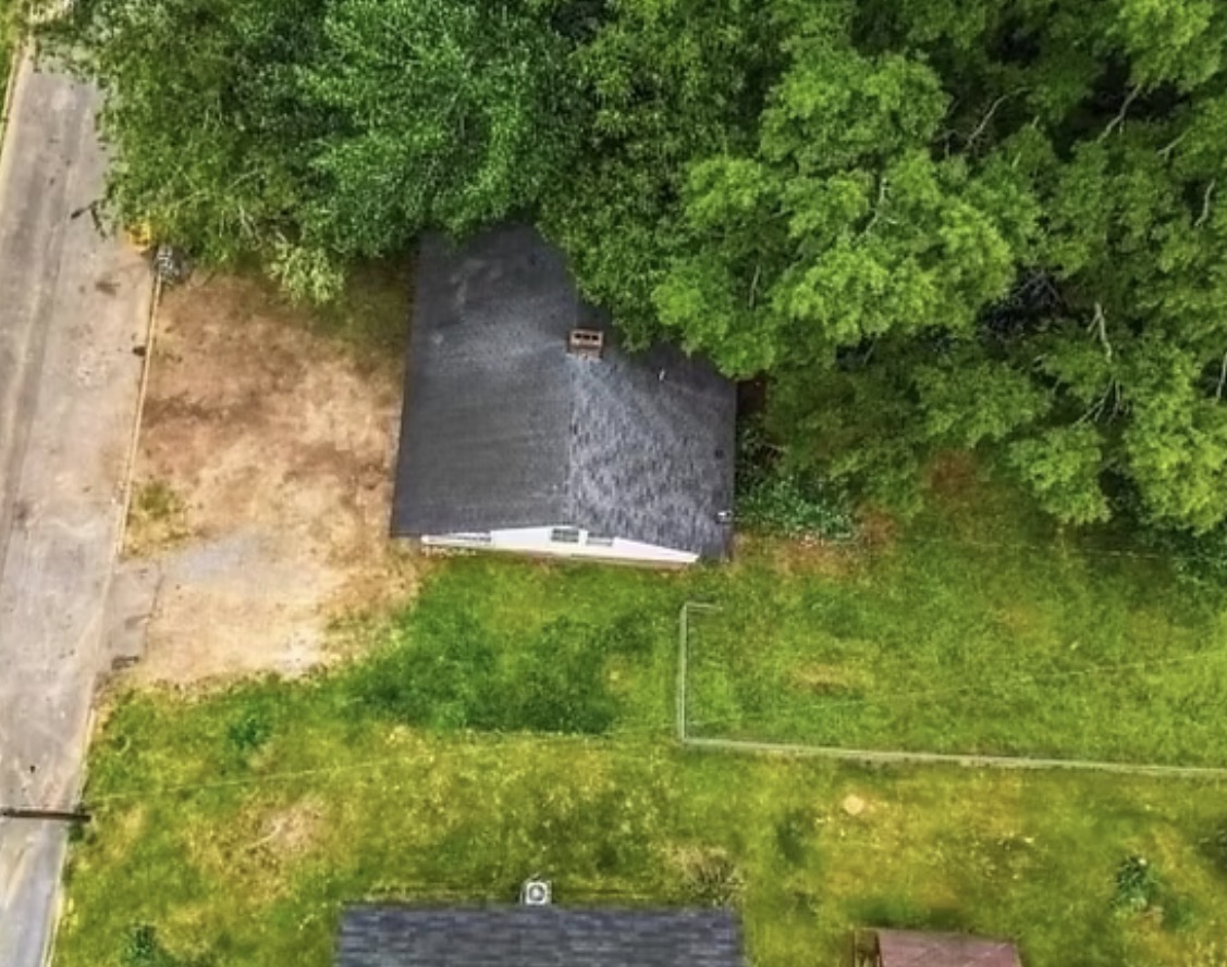 Aerial view of the cleared yard after property cleanup